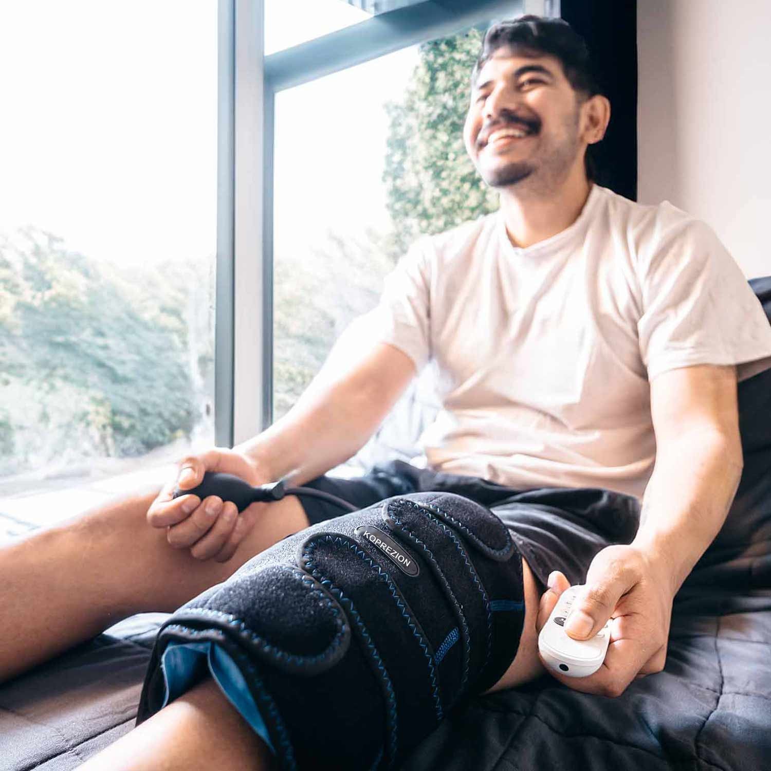 Man relaxing while wearing the Koprezion Knee CryoPump